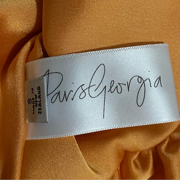 NEW Paris Georgia Ocher Peplum Top Size S NWT - Picture 7 of 9